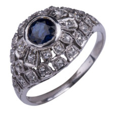Gouden ring met diamant en saffier.