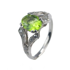 Gouden ring met peridoot en diamant